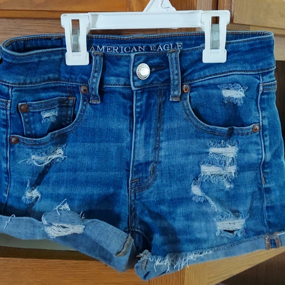 Light/dark blue denim ripped jeans size Size 2 and they are super stretch